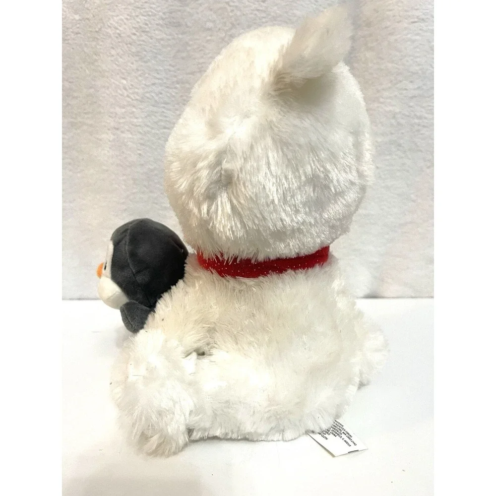 Plush animated Singing Bear holding a Penguin Singing, 